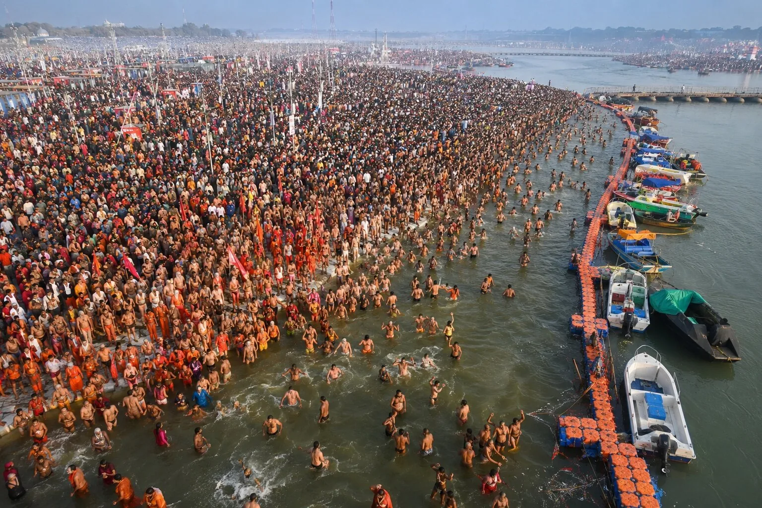 Pilgrims at a Shahi Snan bathing procession — choosing a bathing date for Nashik Simhastha Kumbh Mela 2027